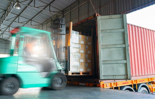 Forklift unloading sustainably secured supplies